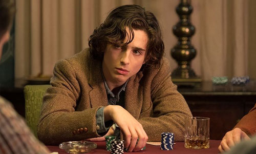 Timothée Chalamet playing poker in A Rainy Day in New York