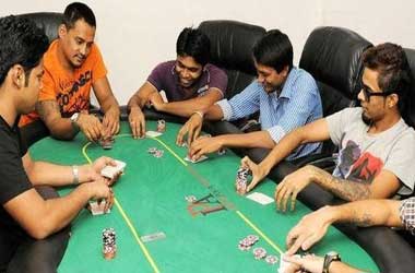 group of friends playing poker