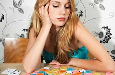 Uninterested Women playing poker